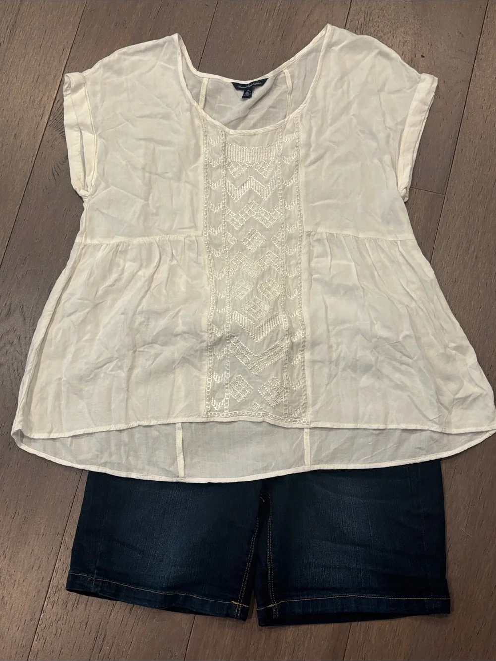Blouse and denim shorts
